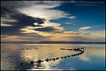 Picture: Clouds over oyster floats owned by Morro Bay Oyster Company in Morro Bay, California