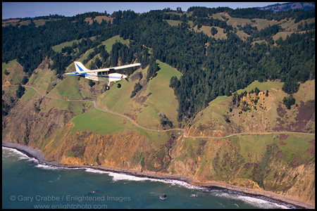 Photo: Single engine plane (Maule) over Highway One along the Sonoma County coast, north of Jenner, California
