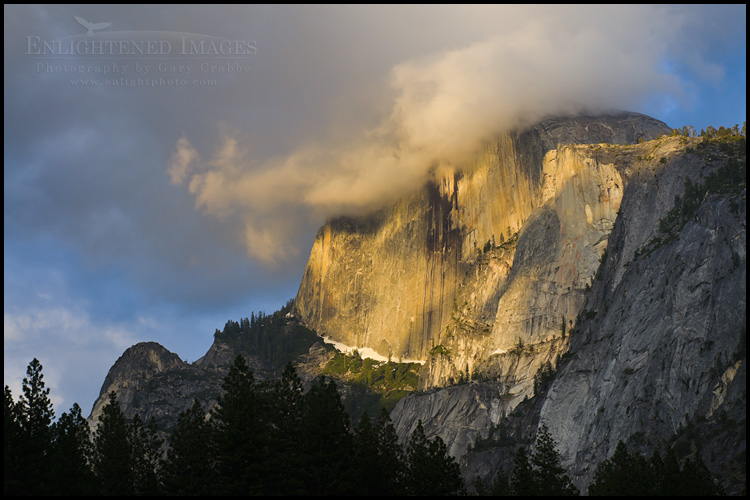 Image: Storm clouds shroud the summit of Half Dome at sunset, Yosemite National Park, California