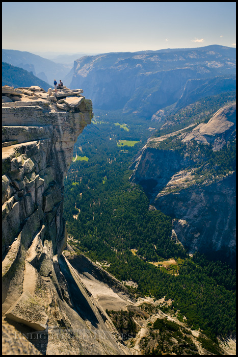 Image: Hikers on the summit of Half Dome, Yosemite National Park, California