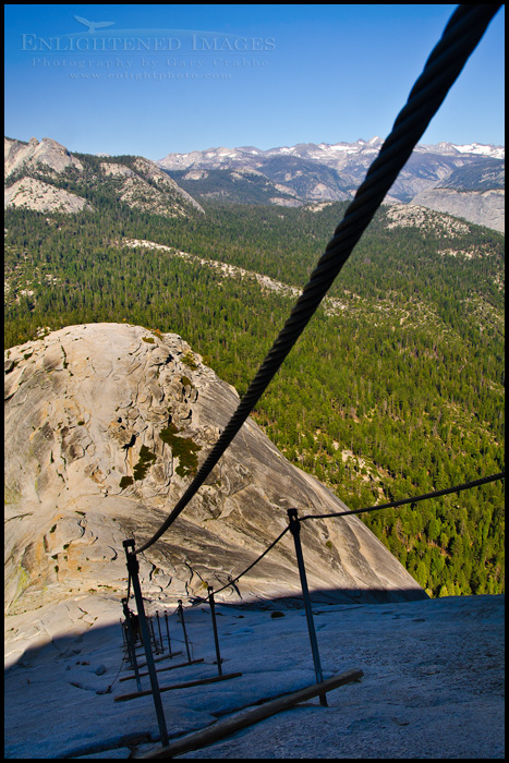 Image: The view while looking down, descending the cables from the summit of Half Dome, Yosemite National Park, California