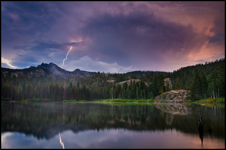 Image: Lightning bolt striking the Sierra Buttes reflected in Packer Lake, Sierra County, California