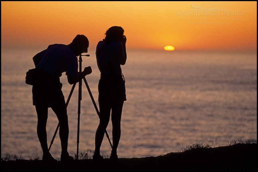 Photo: Photographer couple shooting the sunset together from the Marin Headlands, California Image: Photographer couple shooting the sunset together from the Marin Headlands, California