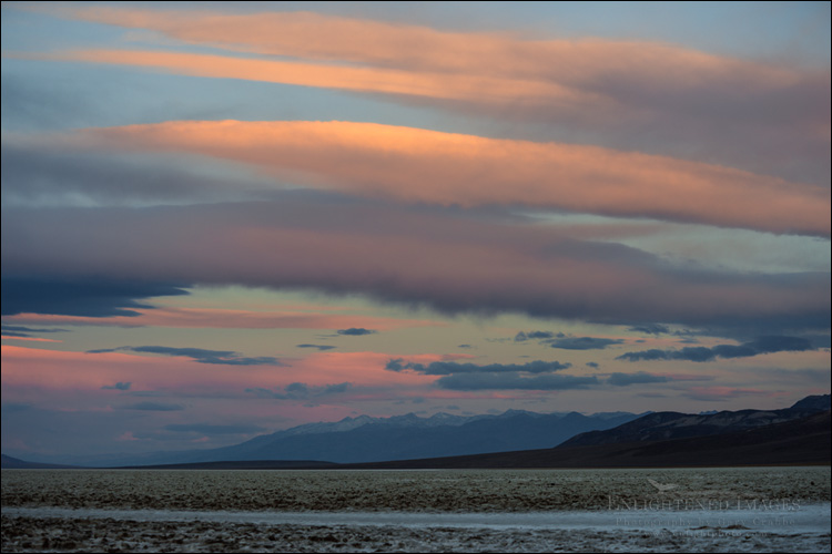 Photo: Morning light on clouds over the Badwater Basin, Death Valley National Park, California Image: Morning light on clouds over the Badwater Basin, Death Valley National Park, California