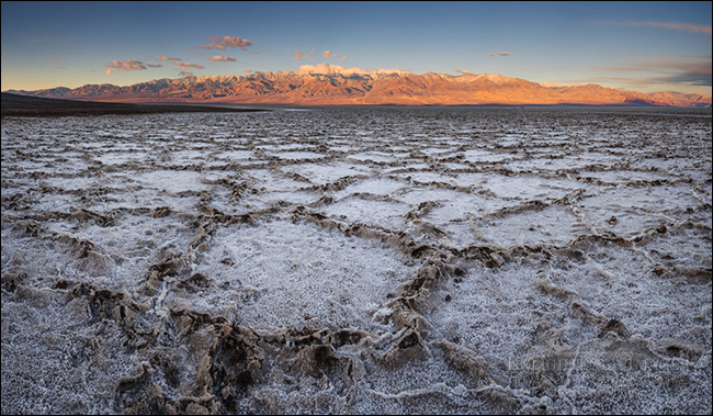 Photo: Panorama of the salt formations at sunrise in the Badwater Basin, (at 282 feet below sea level, it's the lowest elevation in North America) Death Valley National Park, California. Image: Panorama of the salt formations at sunrise in the Badwater Basin, (at 282 feet below sea level, it's the lowest elevation in North America) Death Valley National Park, California.