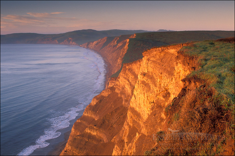 Photo: Sunrise light on coastal cliffs above Drakes Beach, Drakes Bay, Point Reyes National Seashore, Marin County, California Image: Sunrise light on coastal cliffs above Drakes Beach, Drakes Bay, Point Reyes National Seashore, Marin County, California