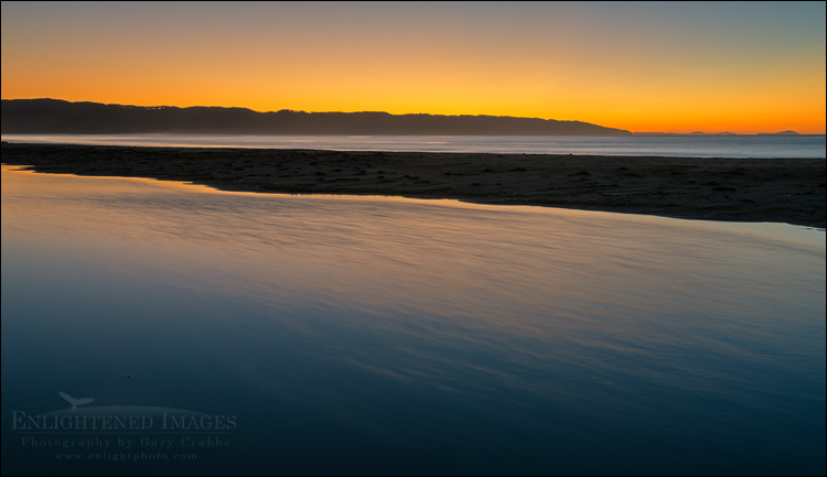 Photo: Photographer shooting the sunrise at Drakes Beach, Point Reyes National Seashore, Marin County, California Image: Photographer shooting the sunrise at Drakes Beach, Point Reyes National Seashore, Marin County, California