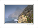 Steep rugged rocky slopes in fog, along the Big Sur Coast, Monterey County, California