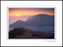Sunset over the Pacific Ocean and the hills above Catalina Harbor, near Two Harbors, California