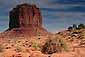 Merrick Butte rising over desert floor, Monument Valley, Arizona