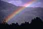 Rainbow during a fall rain storm, near Pemberton, British Columbia, Canada