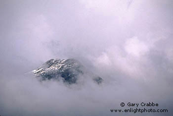 Storm clouds and mountain peak, near Whistler, Sea-to-Sky Road, British Columbia, Canada