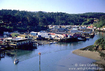 Fishing boat heading out to sea  from Noyo Harbor, Noyo River, Fort Bragg, Mendocino Coast, California