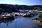 Fishing boat heading out to sea  from Noyo Harbor, Noyo River, Fort Bragg, Mendocino Coast, California