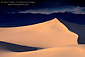 Sunset light on desert sand dune after a storm, near Stovepipe Wells, Death Valley National Park, California; Stock Photo image picture photograph art decor print wall mural gallery