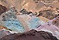 Colored rocks and minerals on eroded hillside at Artists Palette, Black Mountains, Death Valley National Park, California