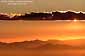 Sunburst through cloud layer over San Francisco Bay and Angel Island, from the Berkeley Hills, California