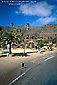 Picture: Boy on beach throwing rocks into water, Two Harbors, Catalina Island, California