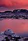 Red clouds at sunset over mountain lake, Hoover Wilderness, near Yosemite National Park, California