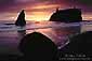 Sunset through storm clouds over sea stacks, Ruby Beach, Olympic National Park, Washington