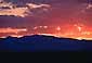 Red sky at sunset through storm clouds, Colorado