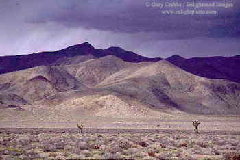 Rain storm clouds over high deset near Keeler, California