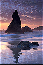 Photo: Sunset and clouds over sea stack at Bandon State Beach, Bandon, Oregon