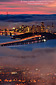 Sunset and fog over San Francisco, California