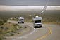 Image: Pair of Recreational Vehicle (RV's) Campers on curving desert highway, near Death Valley, California