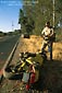 Picture: California Highway Patrol (CHP) Officer investigating solo motorcycle accident along rural country road, Napa County, California