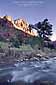 Sunset light on Bridge Mountain over Virgin River, Zion National Park, Utah