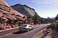 Car on the Zion - Mount Carmel Highway near Checkerboard Mesa, Zion National Park, Utah