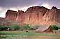 Barn and Pasture beneath red rock cliffs at Fruita, Capitol Reef National Park, Southern Utah