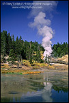 Picture: Tourist boardwalk and steam over the fragile ground at the Grand Prismatic Spring, Midway Geyser Basin, Yellowstone National Park, Wyoming